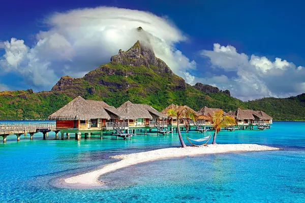 Overwater bungalows on the lagoon, Bora Bora