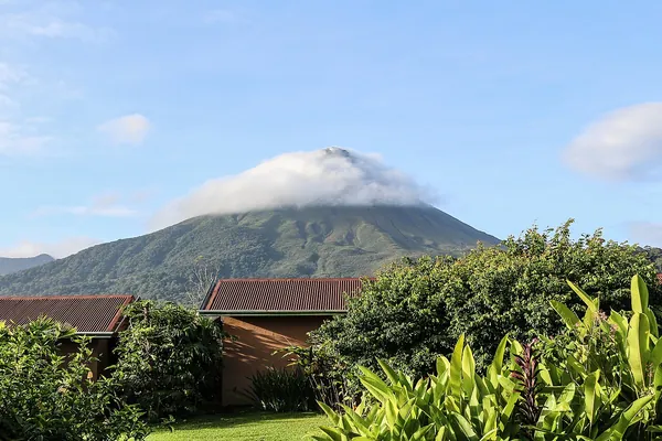 Arenal Volcano above green countryside, Costa Rica