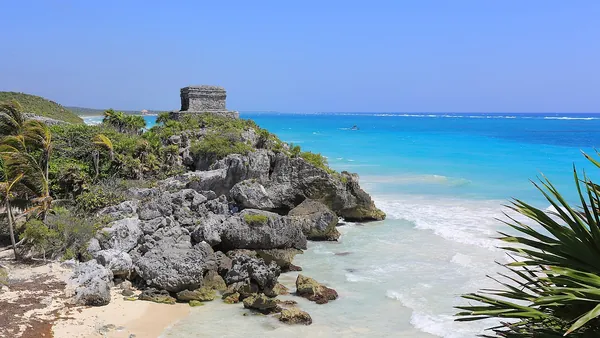 Temple of the Wind God ruins above the sea at Tulum