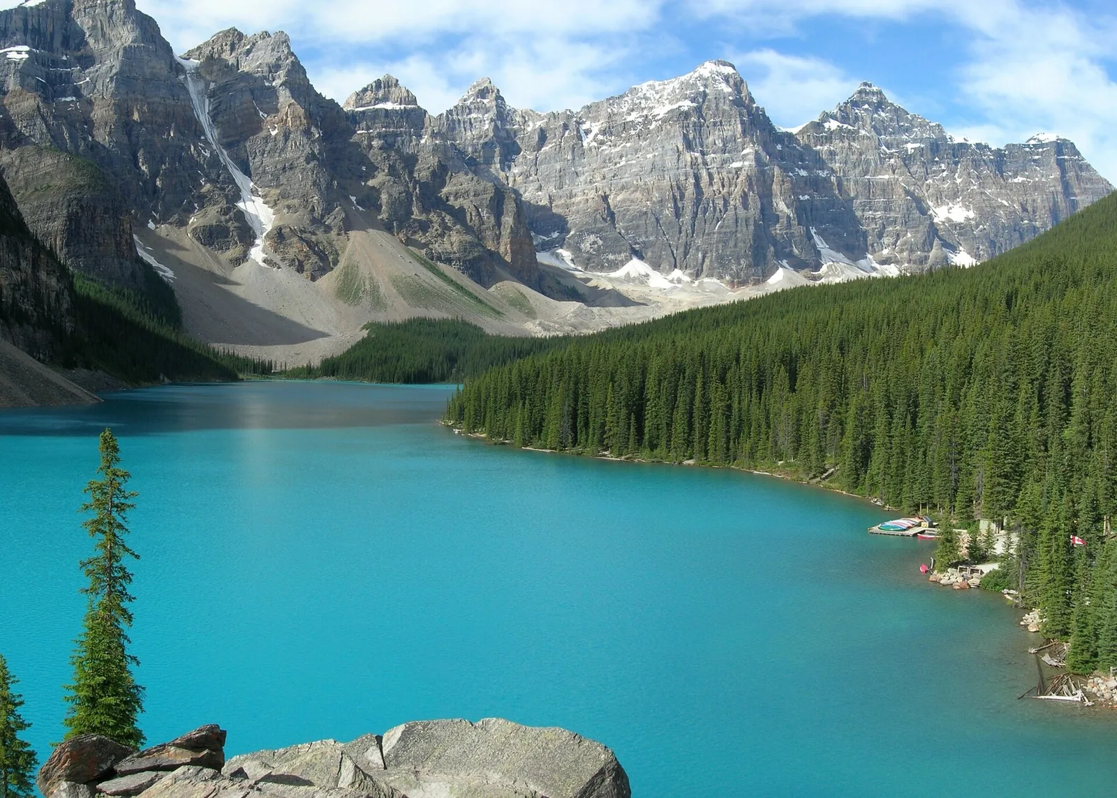Turquoise Moraine Lake beneath snowcapped peaks in Banff National Park, Canada